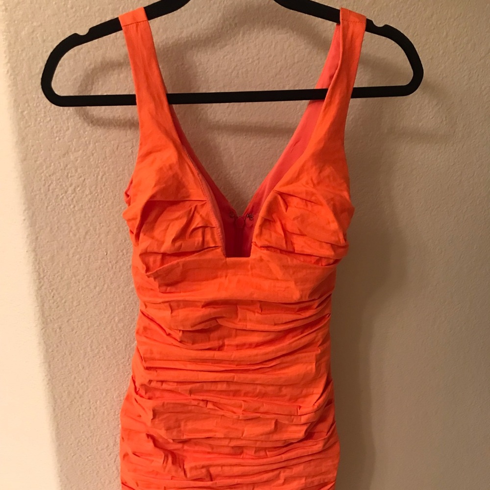An orange dress from antelier Nicole Miller